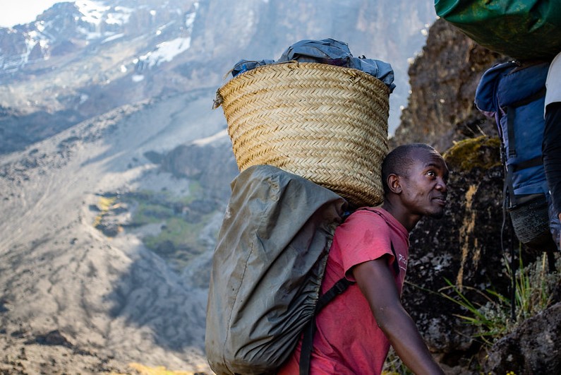 Porters carrying food