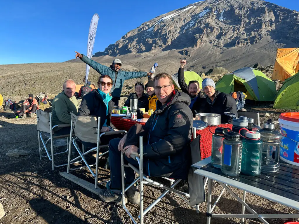 AOL trekkers having lunch at the slopes of Mt. Kilimanajro