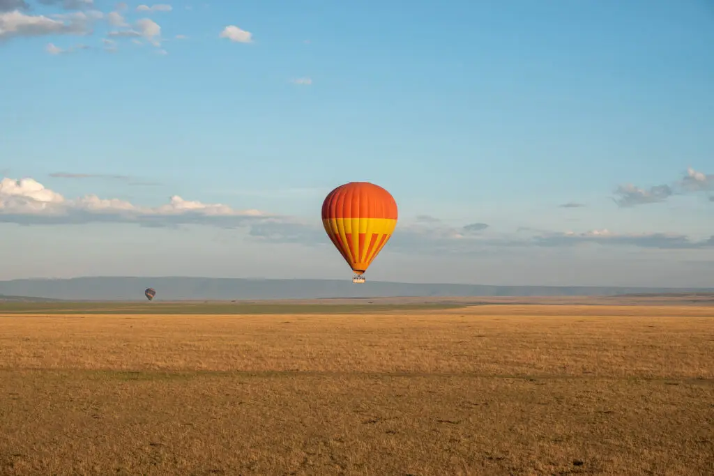 Why visit Africa? The Hot air balloon, experience, towering over the maasai mara of Kenya or serengeti in Tanzania and catching an early morning sunrise is nothing short of magical