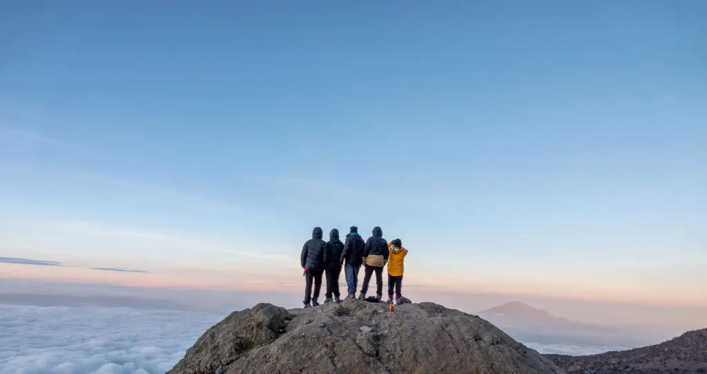 Climb higher for a few hours, soak in the views, then sleep lower — “climb high, sleep low” boosts acclimatisation and brings you closer to the summit.