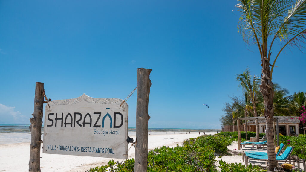 Blue skies over Sharazad in Zanzibar: white sand, swaying palms and turquoise Indian Ocean