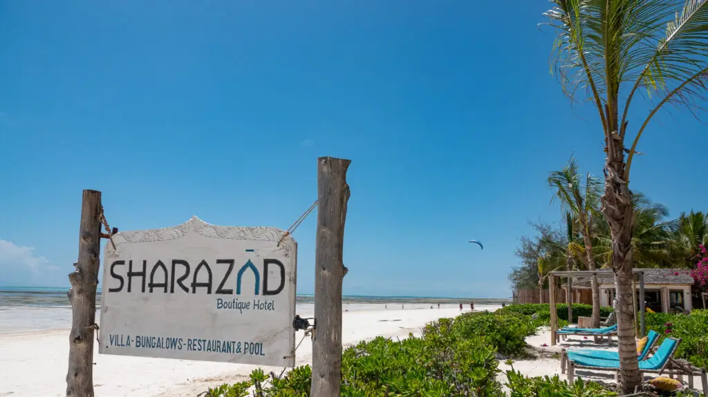 Blue skies over Sharazad in Zanzibar: white sand, swaying palms and turquoise Indian Ocean