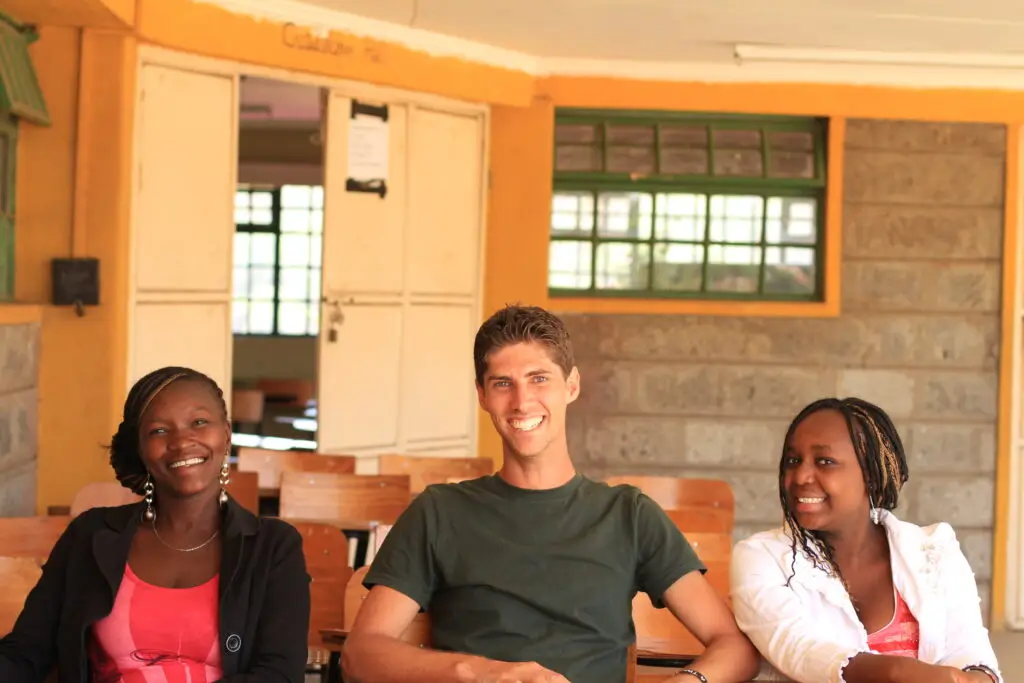 Nate having fun at the Mirror of Hope with co-founder Judy (left) and Patricia (right).