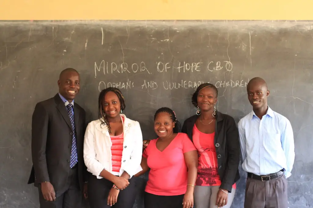 mirror of hope founder Tommy Nyawir with graduates