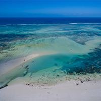 aerial-shot-beautiful-calm-blue-ocean-blue-sky-captured-zanzibar-africa