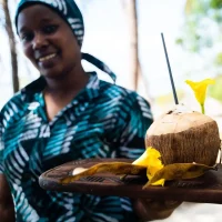 Drinking fresh coconut juice on a Zanzibar holiday